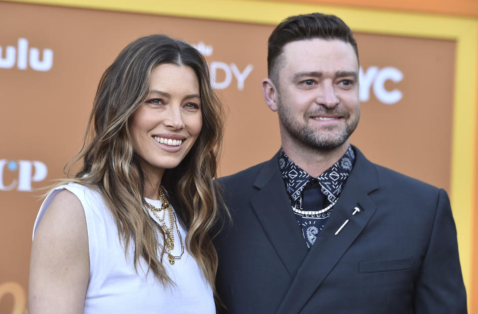 Cast member and executive producer Jessica Biel, left, arrives with her husband, Justin Timberlake, at the Los Angeles premiere of "Candy," on Monday, May 9, 2022 at El Capitan Theatre. (Photo by Jordan Strauss/Invision/AP)