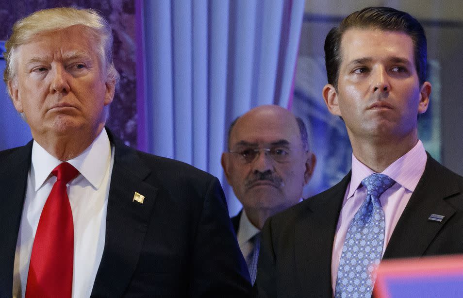 FILE - This file photo from Wednesday Jan. 11, 2017, shows President-elect Donald Trump, left, his chief financial officer Allen Weisselberg, center, and his son Donald Trump Jr., right, during a news conference at Trump Tower in New York. 
