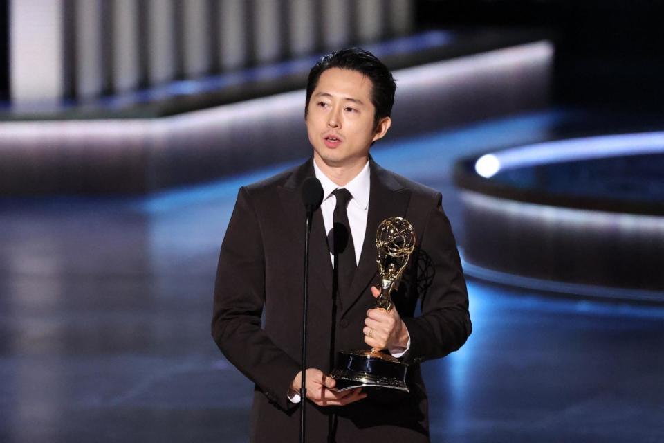 PHOTO: Steven Yeun accepts the Outstanding Lead Actor in a Limited or Anthology Series or Movie award for 'Beef' onstage during the 75th Emmy Awards at the Peacock Theatre, Jan. 15, 2024, in Los Angeles. (Mario Anzuoni/Reuters)