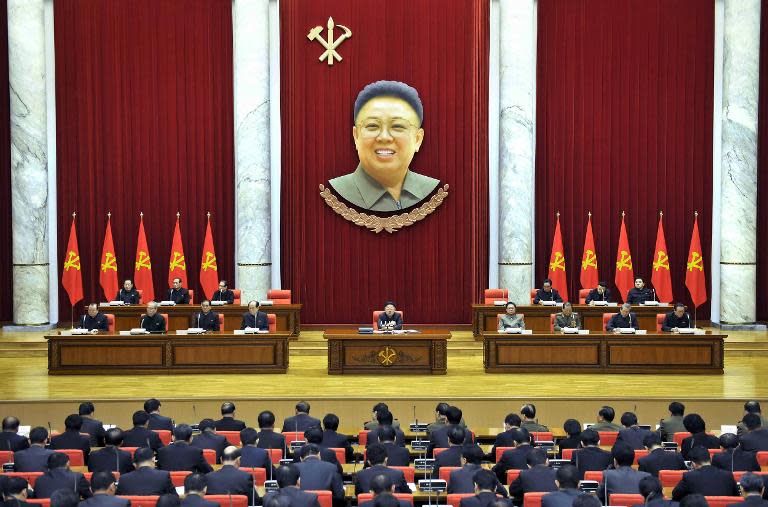 North Korean leader Kim Jong-Un (C) attends a meeting the Political Bureau of the Central Committee of the Workers' Party of Korea in Pyongyang, on December 8, 2013