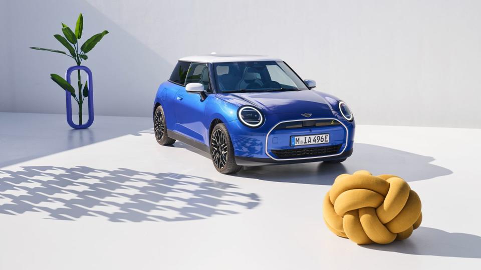 2025 mini cooper electric lineup in ocean blue with white interior