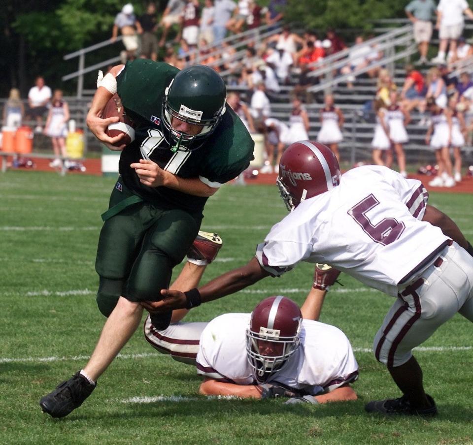 Southside's Jimmy McCauley heads for the end zone on an 11-yard touchdown reception in September of 2001.