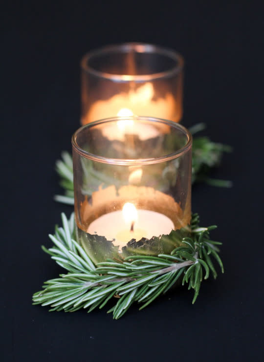 Dress votive candles in rosemary.