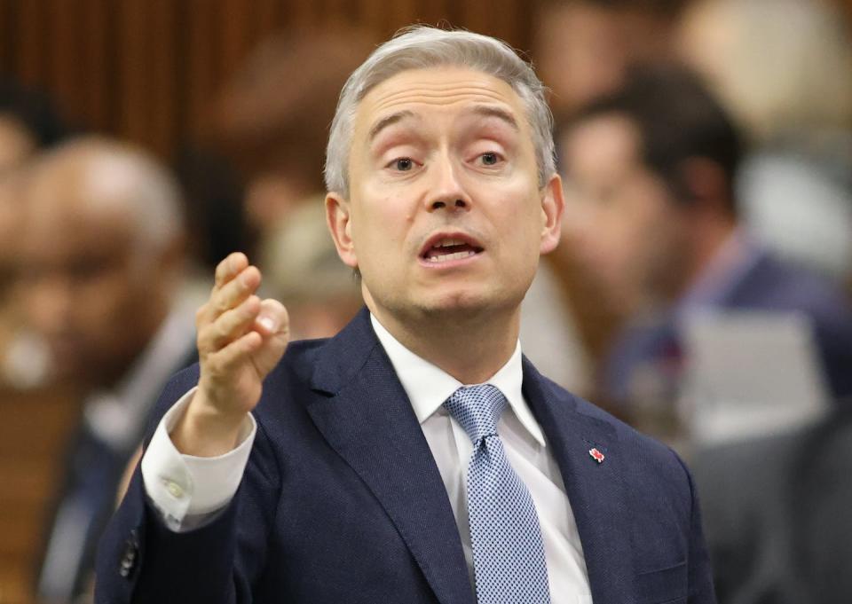 Innovation, Science and Industry Minister François-Philippe Champagne rises during Question Period in the House of Commons on Parliament Hill in Ottawa in February 2023. THE CANADIAN PRESS/ Patrick Doyle