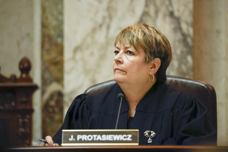 Wisconsin Supreme Court Justice Janet Protasiewicz listens to arguments during a redistricting hearing at the Wisconsin state Capitol Building in Madison, Wis., on Tuesday, Nov. 21, 2023. (Ruthie Hauge/The Capital Times via AP, Pool)