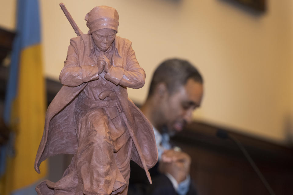 Artist, Alvin Pettit speaks at the podium as his winning sculpture of Harriet Tubman is unveiled on Monday, Oct. 30, 2023, at Philadelphia City Hall in Philadelphia. (Jose F. Moreno/The Philadelphia Inquirer via AP)