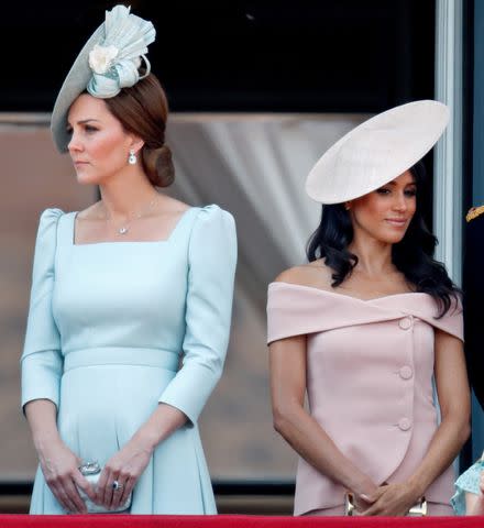 <p>Max Mumby/Indigo/Getty Images</p> Kate Middleton and Meghan Markle at Trooping the Colour in 2018.
