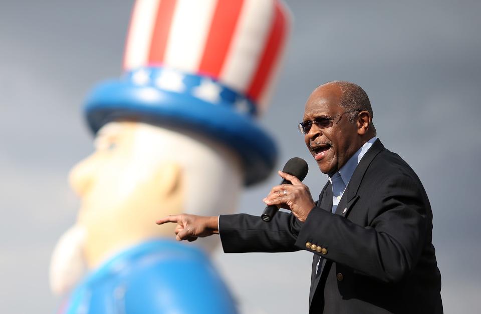 Former Republican presidential candidate Herman Cain speaks during an American For Prosperity rally on July 23, 2012 in Reno, Nevada. Hundreds of people attended an Americans For Prosperity rally to see former Republican presidential candidate speak.