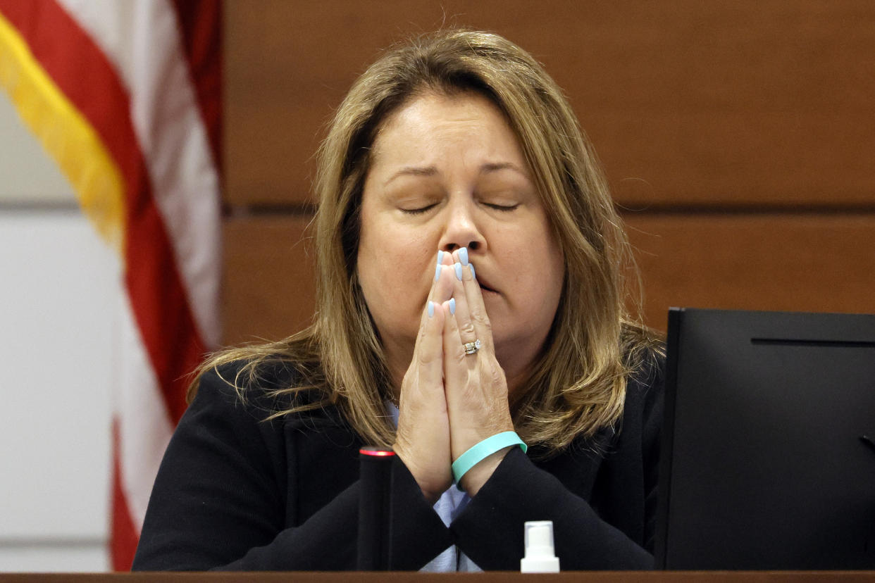 Jennifer Montalto pauses before giving her victim impact statement during the penalty phase of the trial of Marjory Stoneman Douglas High School shooter Nikolas Cruz at the Broward County Courthouse in Fort Lauderdale, Fla., Wednesday, Aug. 3, 2022. Montalto's daughter, Gina, was killed in the 2018 shootings. Cruz previously plead guilty to all 17 counts of premeditated murder and 17 counts of attempted murder in the 2018 shootings. (Amy Beth Bennett/South Florida Sun Sentinel via AP, Pool)