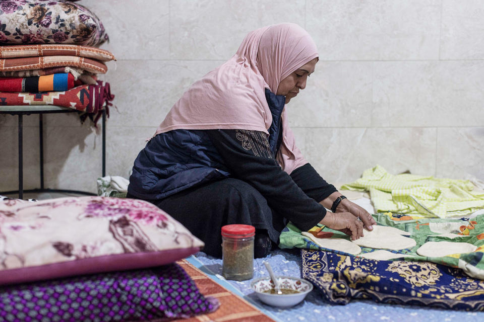 Hissan Abu Qwaider prepares fresh pita bread (Avishag Shaar-Yashuv for NBC News)