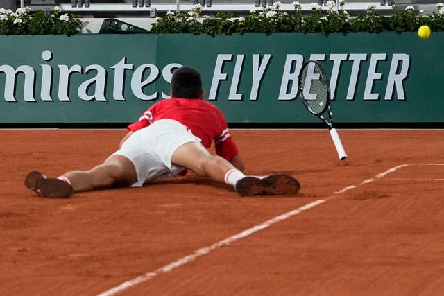 Novak Djokovic fell to the clay during the fourth set