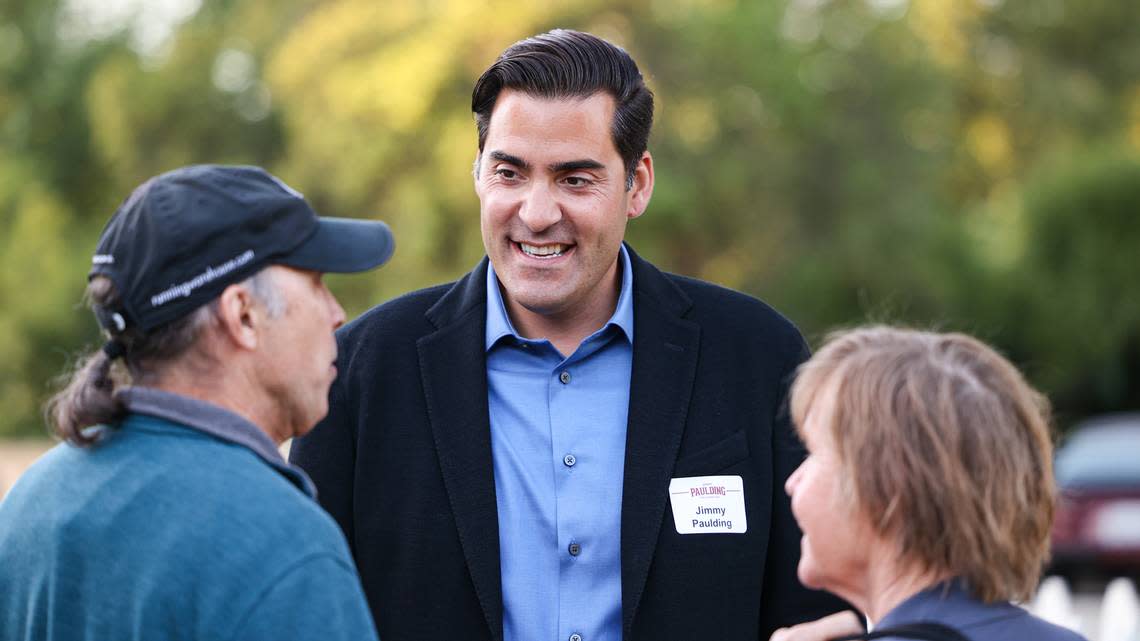 Michael and Merrilee Costello talk to Jimmy Paulding at his election night party on Tuesday, June 7, 2022. Paulding defeated Lynn Compton for the District 4 seat, by a margin of 51.3% to 48.4%.