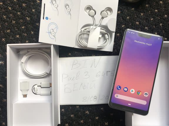 The box for this pre-release Pixel 3 XL includes wired Pixel Buds along with the usual accessories.