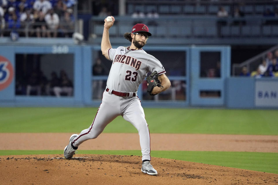 Arizona Diamondbacks starting pitcher Zac Gallen throws to a Los Angeles Dodgers batter in Game 2 of a baseball NL Division Series, Monday, Oct. 9, 2023, in Los Angeles. (AP Photo/Mark J. Terrill)