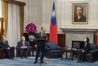 In this photo released by the Taiwan Presidential Office, Taiwanese President Tsai Ing-wen, right, listens as Matas Maldeikis, head of the Lithuanian delegation speaks during a meeting with lawmakers from Baltic states at the Presidential Office in Taipei, Taiwan on Monday, Nov. 29, 2021. Lawmakers from all three Baltic states met with Tsai on Monday in a sign of further cooperation between European Union nations and Taiwan. (Taiwan Presidential Office via AP)