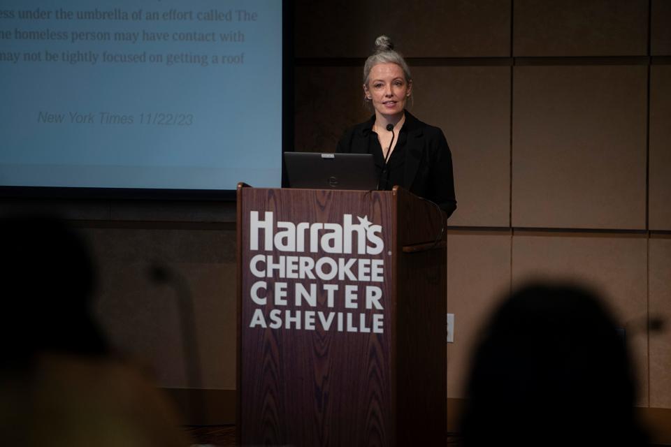 Homeless Strategy Division Manager Emily Ball speaks during a meeting to address homelessness in Asheville, December 4, 2023.