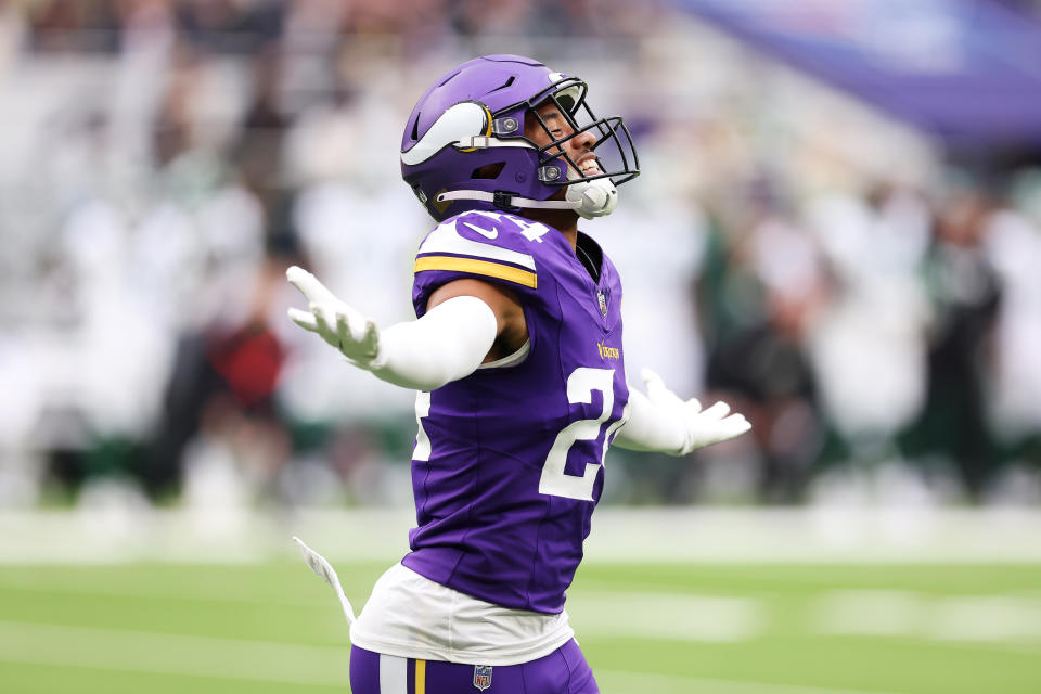 LONDON, ENGLAND - OCTOBER 06: Camryn Bynum of the Minnesota Vikings celebrates an interception during the NFL game between the New York Jets and the Minnesota Vikings at Tottenham Hotspur Stadium on October 06, 2024 in London, England. (Photo by Julian Finney/Getty Images)