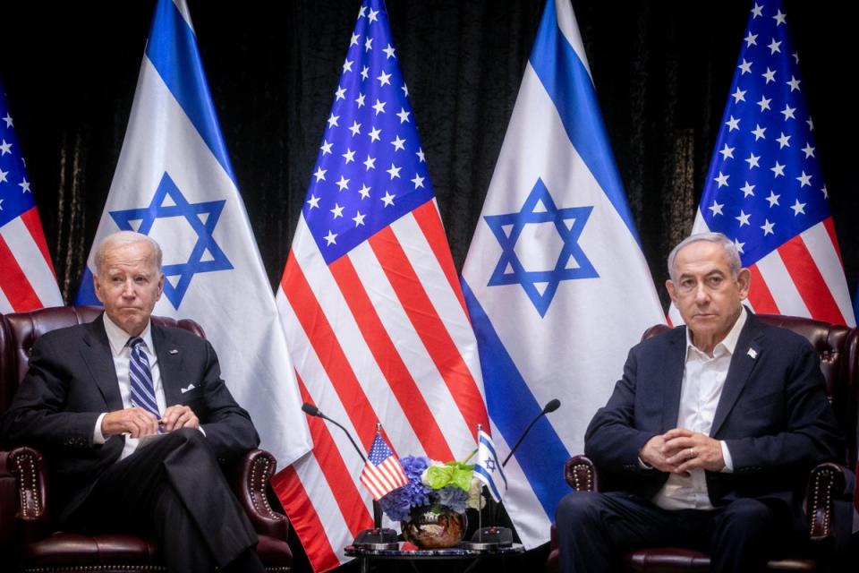 President Joe Biden, sits with Israeli prime minister Benjamin Netanyahu, at the start of the Israeli war cabinet meeting in October last year (Getty)