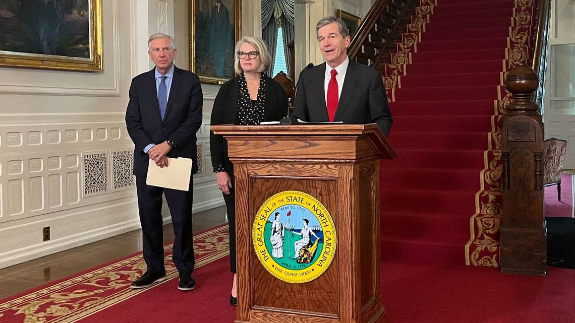 Gov. Roy Cooper, with former UNC System presidents Margaret Spellings and Tom Ross, announces the creation of the Commission on the Future of Public Universities at the N.C. Executive Mansion on Nov. 1, 2022.