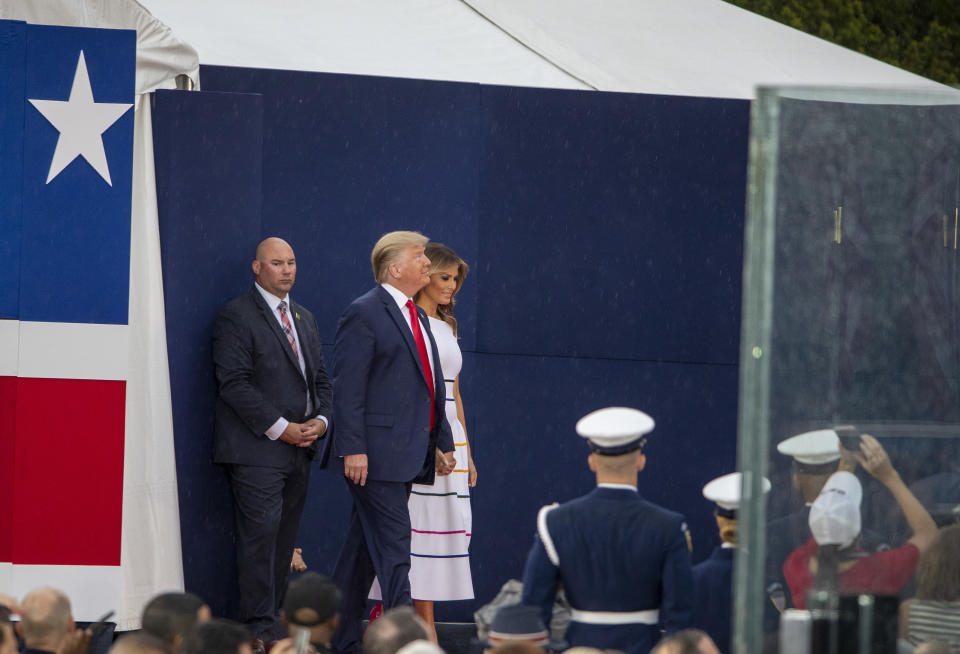 WASHINGTON, DC - JULY 04: President Donald Trump and first lady Melania Trump take the stage on July 04, 2019 in Washington, DC. President Trump is holding a "Salute to America" celebration on the National Mall on Independence Day this year with musical performances, a military flyover, and fireworks. (Photo by Tasos Katopodis/Getty Images)