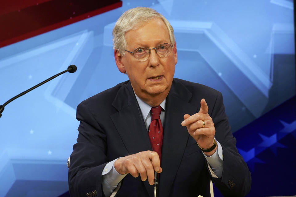 Senate Majority Leader Mitch McConnell, R-Ky., speaks during a debate with Democratic challenger Amy McGrath in Lexington, Ky., Monday, Oct. 12, 2020. (Michael Clubb/The Kentucky Kernel via AP, Pool)