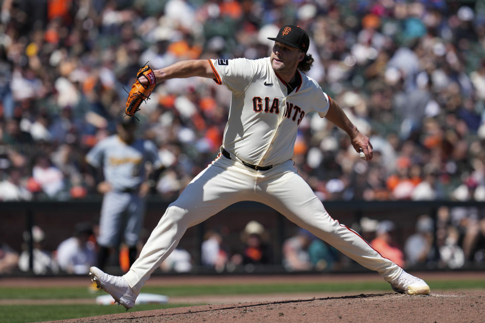San Francisco Giants pitcher Erik Miller throws to a Pittsburgh Pirates batter during the seventh inning of a baseball game Sunday, April 28, 2024, in San Francisco. (AP Photo/Godofredo A. Vásquez)
