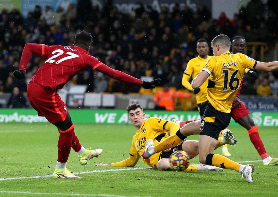 Divock Origi scores Liverpool’s injury-time winner at Wolves (Nigel French/PA) (PA Wire)