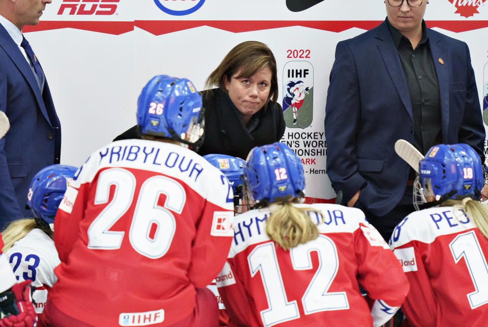 FILE - Czech Republic coach Carla Macleod talks to her players during the IIHF World Championship Woman's ice hockey match between Sweden and Czech Republic in Frederikshavn, Denmark, Tuesday, Aug 30, 2022. Ottawa's yet to be named Professional Women's Hockey League franchise features the largest mix of international talent of the newly established league's six franchises when play opens next week. Even coach Carla MacLeod has international connections. The former Canadian national team player also doubles as head coach of the fast-developing Czech Republic women’s national team. (Henning Bagger/Ritzau Scanpix via AP, File)