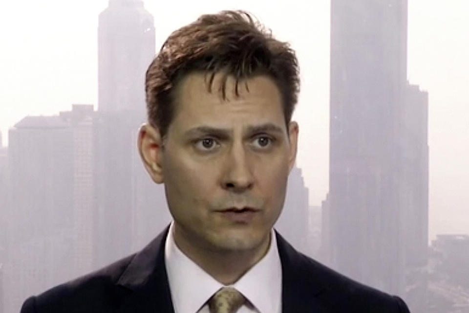 FILE - In this March 28, 2018, file image made from video, Michael Kovrig, an adviser with the International Crisis Group, a Brussels-based non-governmental organization, speaks during an interview in Hong Kong. China said Wednesday, Aug. 26, 2020, it remains firm in its insistence that Canada make the first move to end the detention of two Canadians, following a meeting of the two countries' foreign ministers. (AP Photo, File)