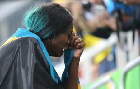 2016 Rio Olympics - Athletics - Final - Women's 400m Final - Olympic Stadium - Rio de Janeiro, Brazil - 15/08/2016. Shaunae Miller (BAH) of Bahamas reacts after winning the gold medal. REUTERS/Sergio Moraes