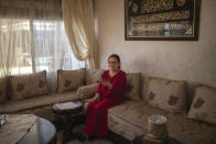 Afifa, 61, video calls with their grandson on the first day of Eid in lockdown due to the Coronavirus pandemic, in Casablanca, Morocco, Sunday, May 24, 2020. Instead of mass prayers and large family gatherings filled with colorful clothes, gifts, and traditional foods, millions of Moroccan Muslims celebrated Eid Al-Fitr at home, subdued and isolated amid their country's newly extended coronavirus lockdown. (AP Photo/Mosa'ab Elshamy)