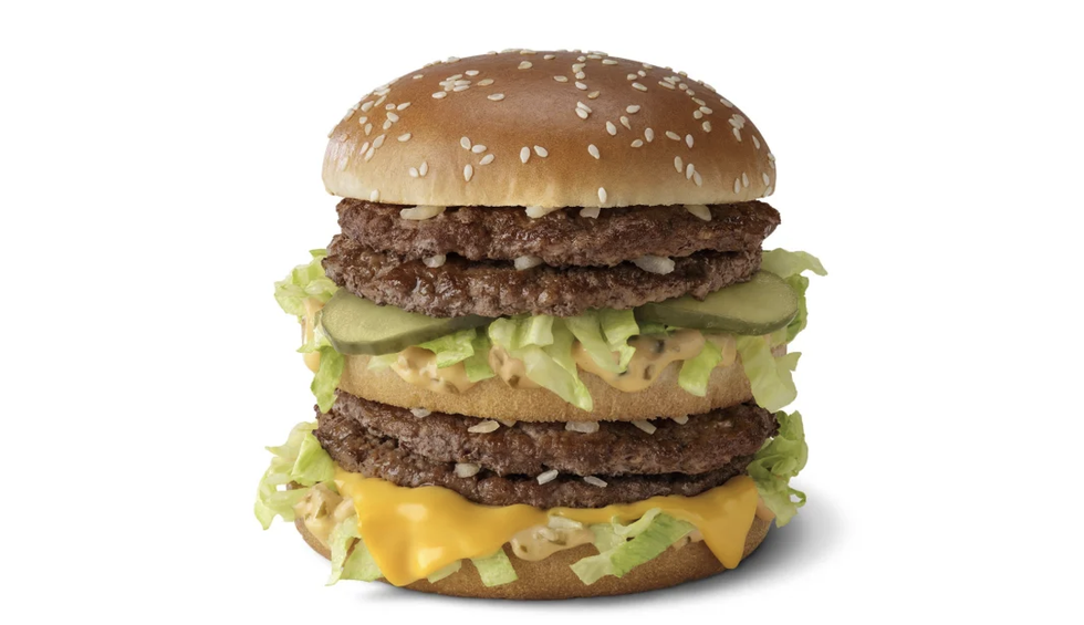 a burger with lettuce and cheese