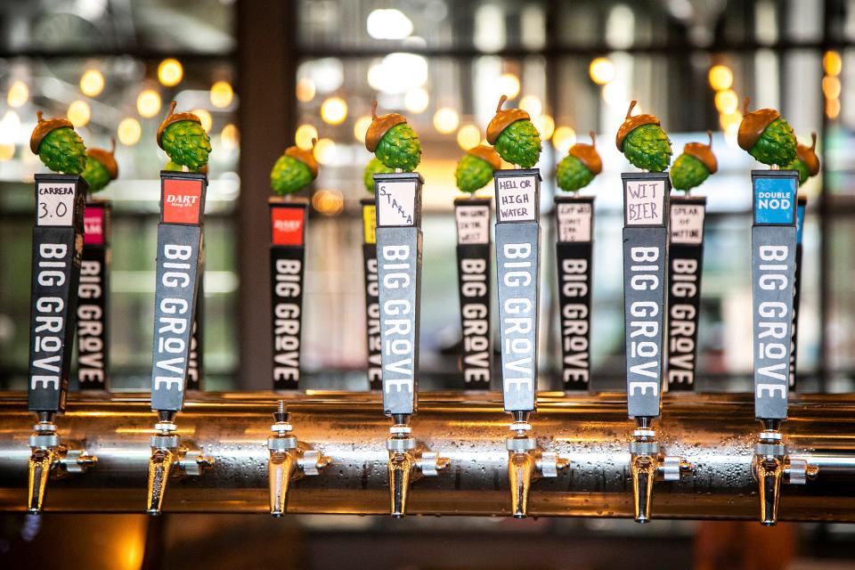 A portion of the variety of beers available on tap are seen at the bar, Tuesday, June 29, 2021, at Big Grove Brewery & Taproom in Iowa City, Iowa.