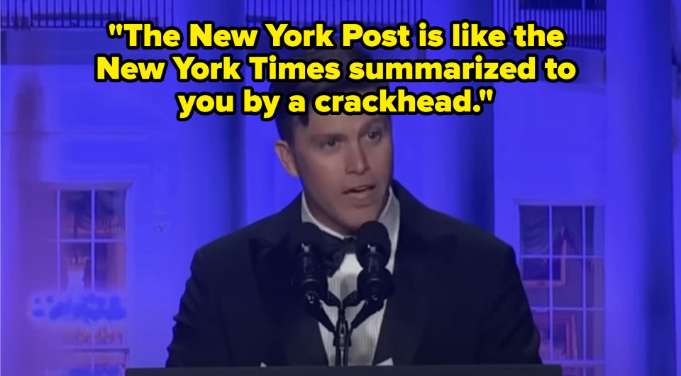 Closeup of Colin Jost onstage saying, "The New York Post is like the New York Times summarized to you by a crackhead"