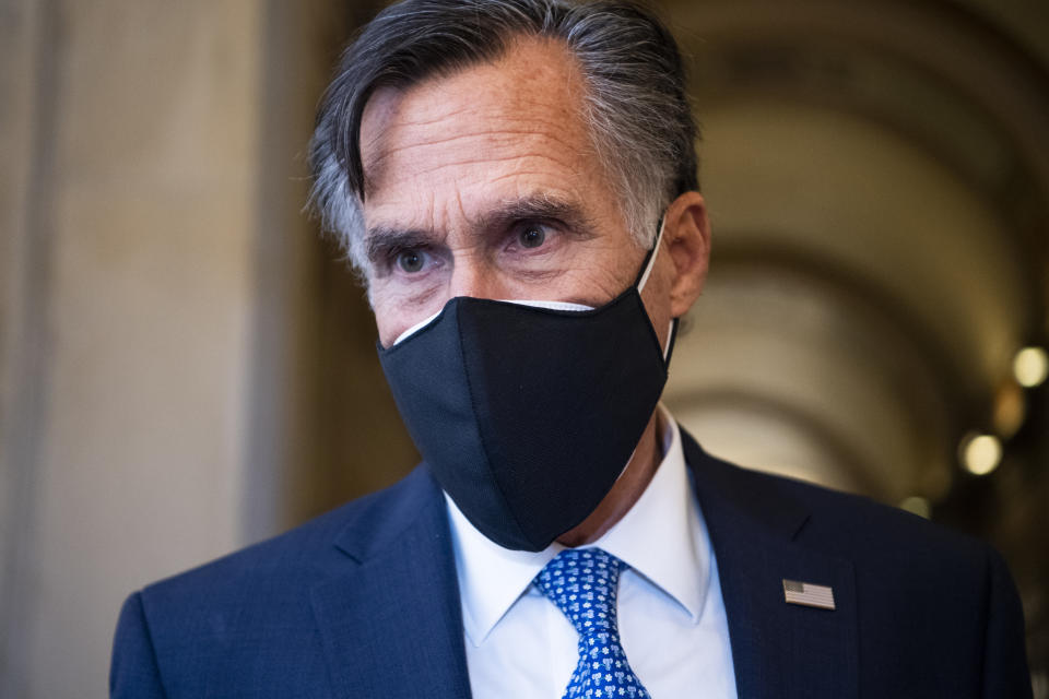 Mitt Romney, R-Utah, speaks on Capitol Hill on Dec. 11. (Photo By Tom Williams/CQ-Roll Call, Inc via Getty Images)