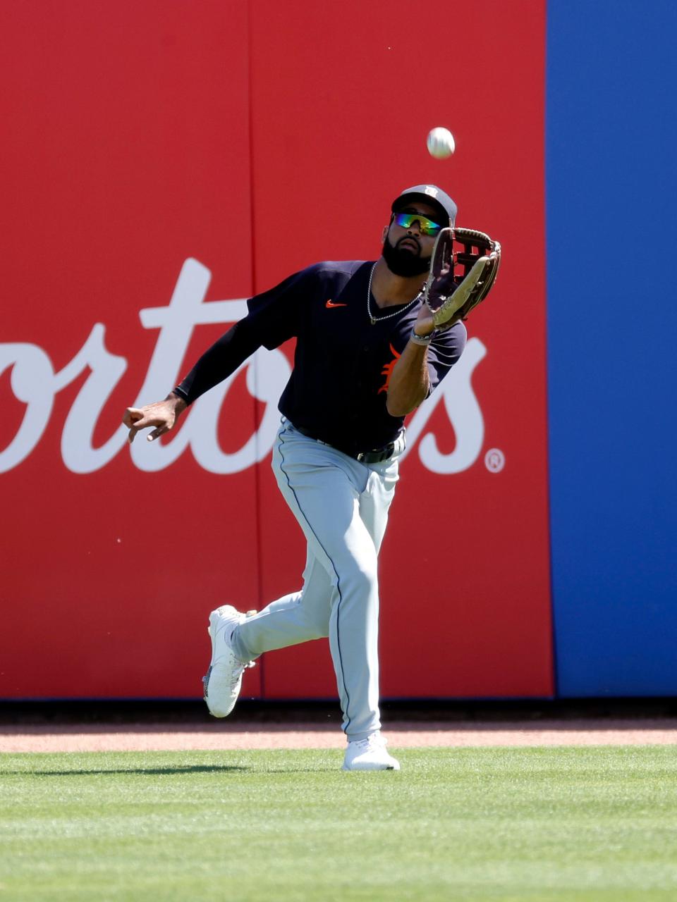 Detroit Tigers center fielder Derek Hill (54) catches a fly ball during the second inning of a spring training game  against the Toronto Blue Jays on March 11, 2021, at TD Ballpark in Dunedin, Florida.