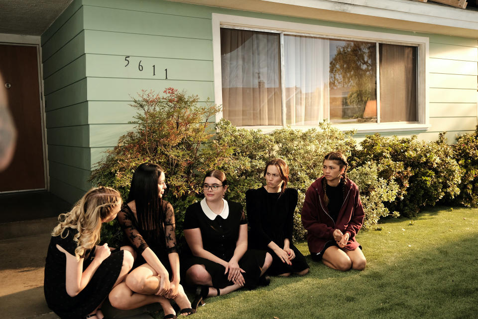 Sydney Sweeney, Alexa Demie, Barbie Ferreira, Maude Apatow, and Zendaya sit on a lawn