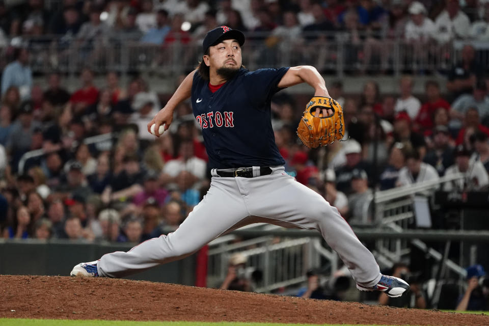 Boston Red Sox relief pitcher Hirokazu Sawamura works in the seventh inning of the team's baseball game against the Atlanta Braves on Tuesday, June 15, 2021, in Atlanta. (AP Photo/John Bazemore)