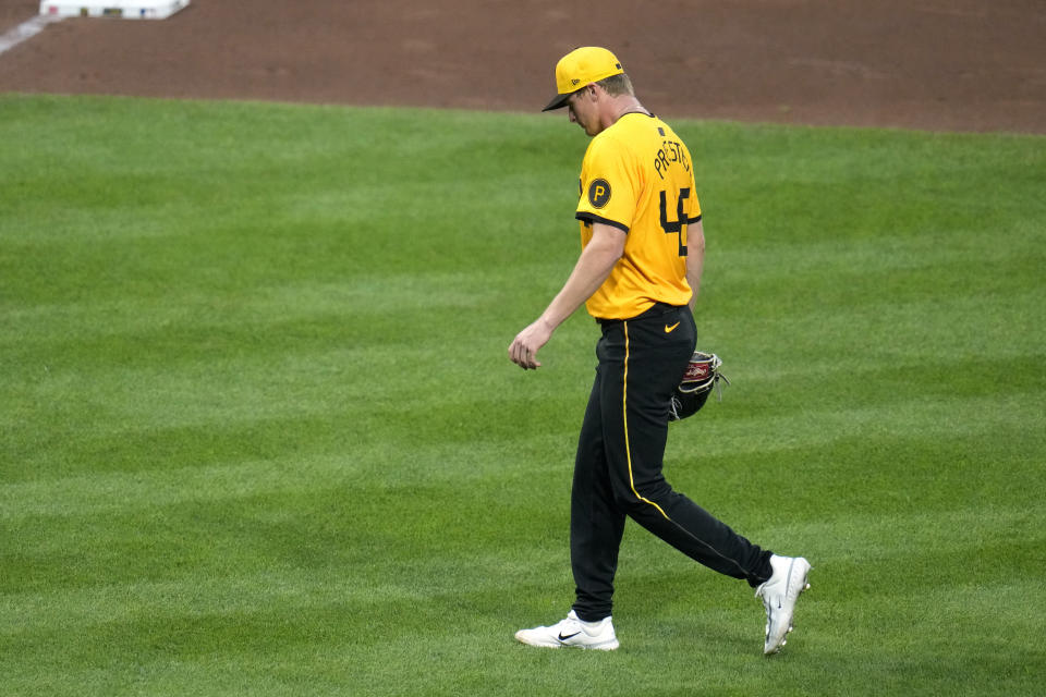 Pittsburgh Pirates starting pitcher Quinn Priester walks to the dugout after being pulled by manager Derek Shelton during the fifth inning of a baseball game against the Boston Red Sox in Pittsburgh, Friday, April 19, 2024. (AP Photo/Gene J. Puskar)