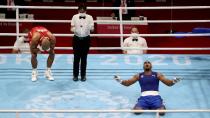 Foto del miércoles del cubano Arlen Lopez Cardona reaccionando tras vencer a Benjamin Whittaker en la final del boxeo olímpico.