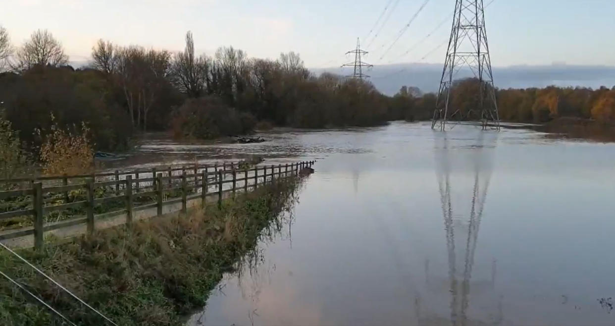 A woman's body has been recovered from floodwater in Derbyshire, as parts of England endured a month's worth of rain in 24 hours (PA)