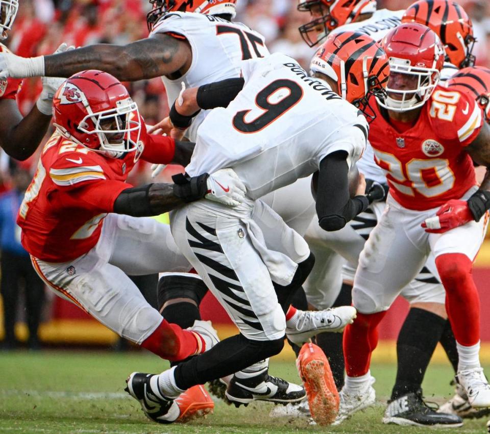 Kansas City Chiefs safety Chamarri Conner (27) sacks Cincinnati Bengals quarterback Joe Burrow (9) in the fourth quarter Sunday, Sept. 15, 2024, at GEHA Field at Arrowhead Stadium.