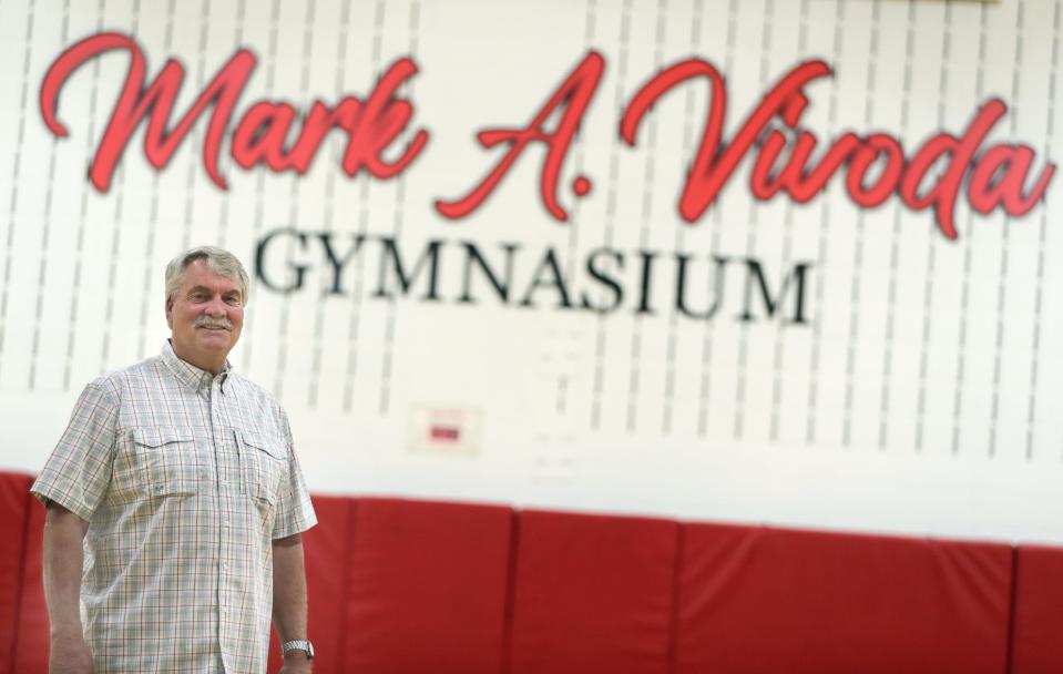 Mark Vivoda stands outside the newly named Mark Vivoda Gymnasium at Houdini Elementary School in Grand Chute.