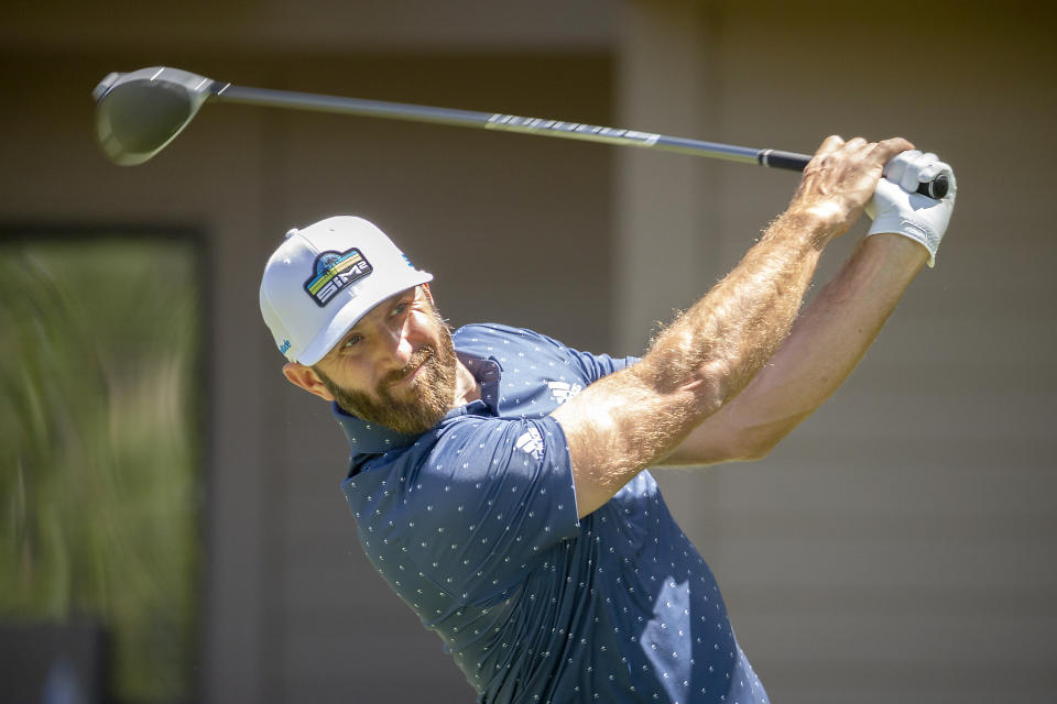 Dustin Johnson watches his drive off the third tee during the third round of the RBC Heritage golf tournament in Hilton Head Island, S.C., Saturday, April 17, 2021. (AP Photo/Stephen B. Morton)