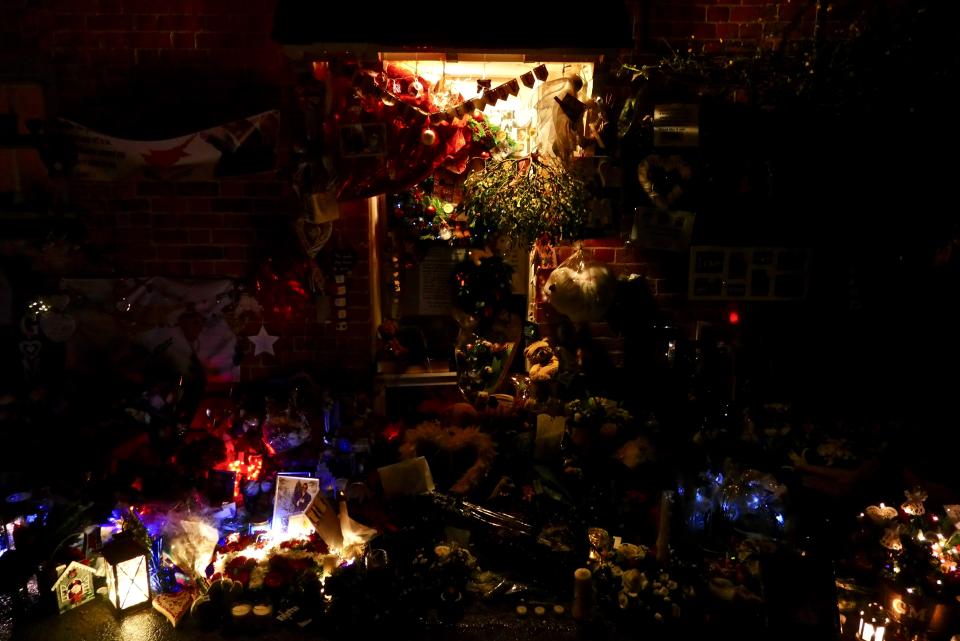 Candle lit tributes to George Michael on the anniversary of his death. (Credit: REX)