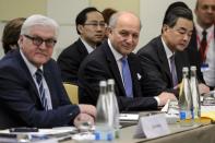 (L-R) German Foreign Minister Frank-Walter Steinmeier, French counterpart Laurent Fabius and Chinese counterpart Wang Yi pictured ahead of a plenary session on Iran nuclear talks in Lausanne, Switzerland, on March 30, 2015