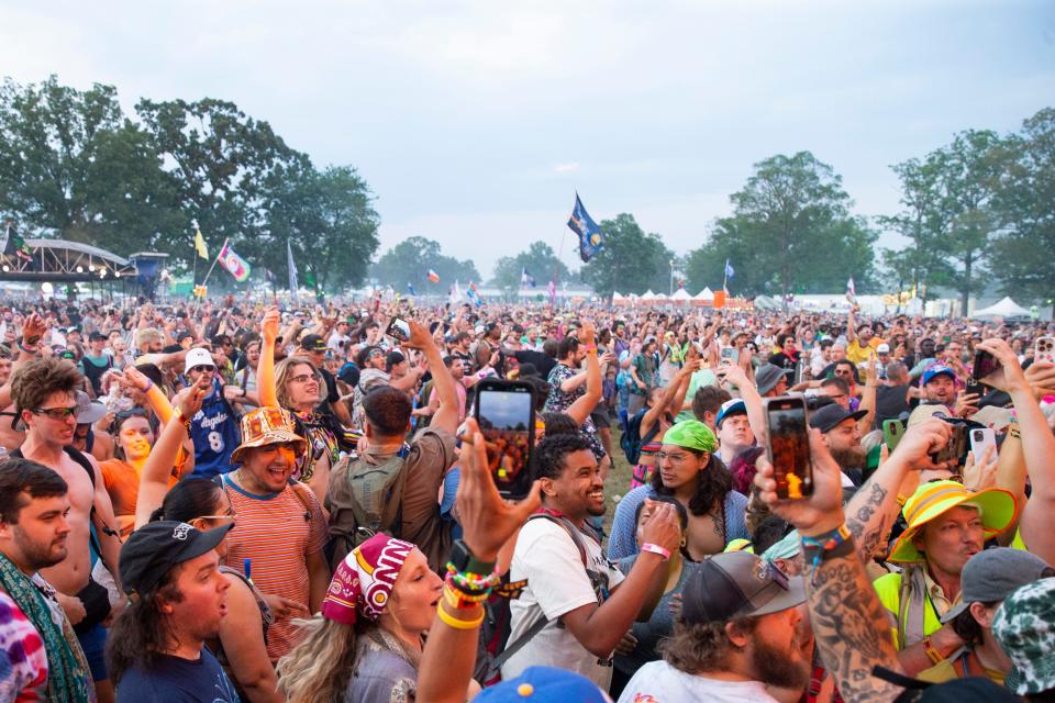 Fans cheer and open up a mosh pit as Three 6 Mafia performs on the second day of Bonnaroo near Manchester, Tenn., on Friday, June 16, 2023.