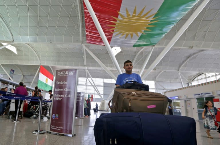 Foreigners, and even a few Kurds, checked in at Arbil airport to leave Iraqi Kurdistan on September 28, 2017 after Baghdad suspended flights to and from the region after an independence referendum