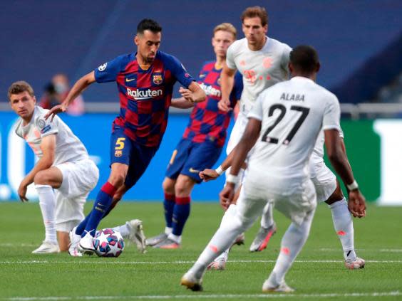 Sergio Busquets on the ball for Barca in midfield (Getty)