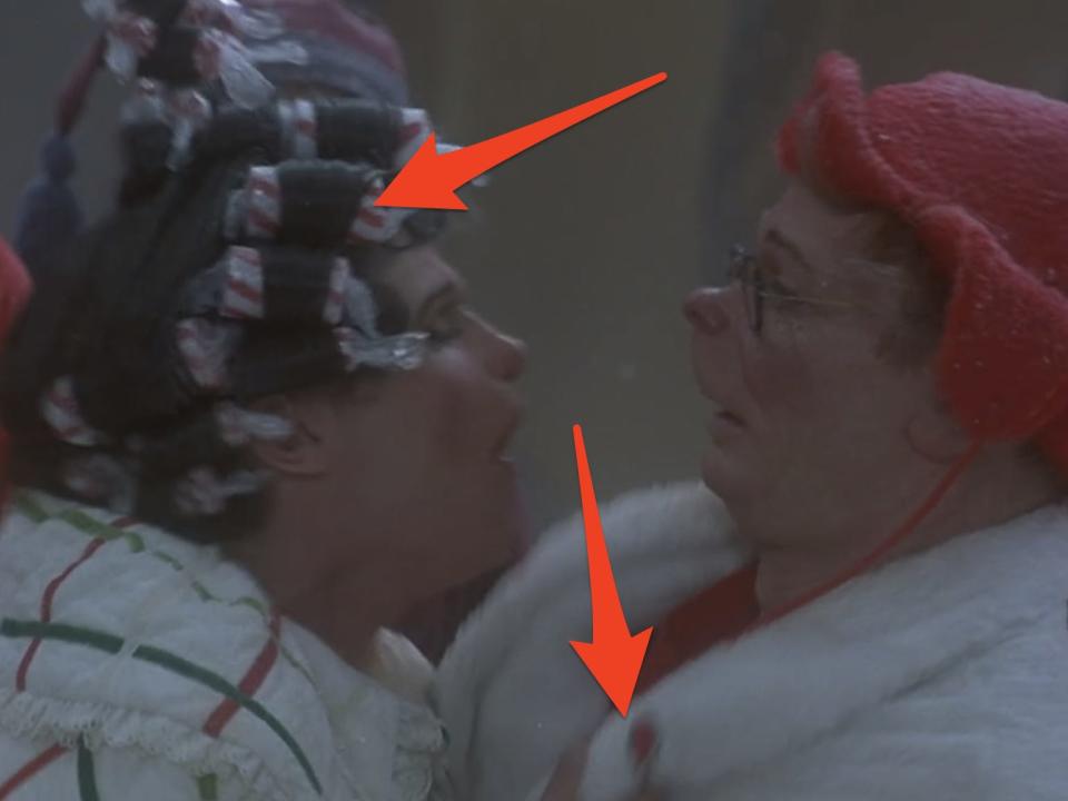 arrows pointing to the lou who's matching accessories in how the grinch stole christmas